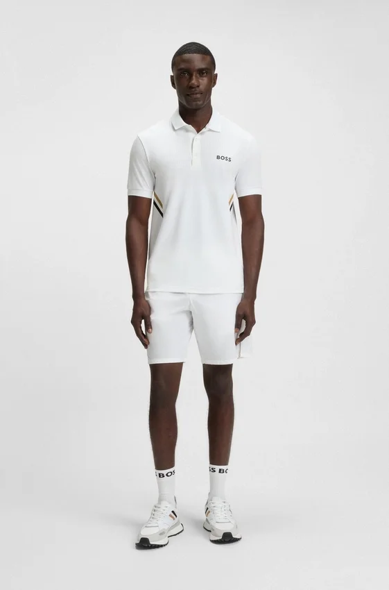 Active moisture-managing slim-fit polo shirt in stretch piqué Active moisture-managing slim-fit polo shirt in stretch piqué