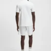 Active moisture-managing slim-fit polo shirt in stretch piqué Active moisture-managing slim-fit polo shirt in stretch piqué