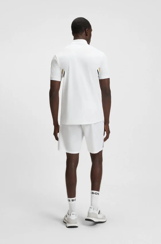 Active moisture-managing slim-fit polo shirt in stretch piqué Active moisture-managing slim-fit polo shirt in stretch piqué