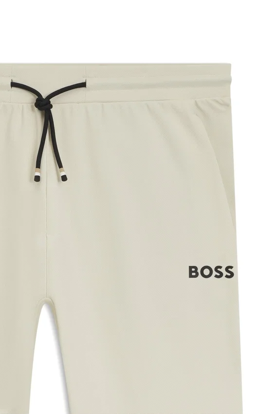 Active stretch-gabardine tracksuit bottoms with thermoregulating technology Active stretch-gabardine tracksuit bottoms with thermoregulating technology
