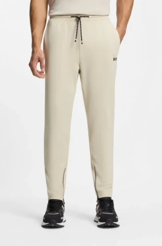 Active Stretch-gabardine tracksuit bottoms with zipped hems