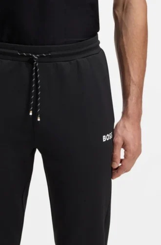Active Stretch-gabardine tracksuit bottoms with zipped hems