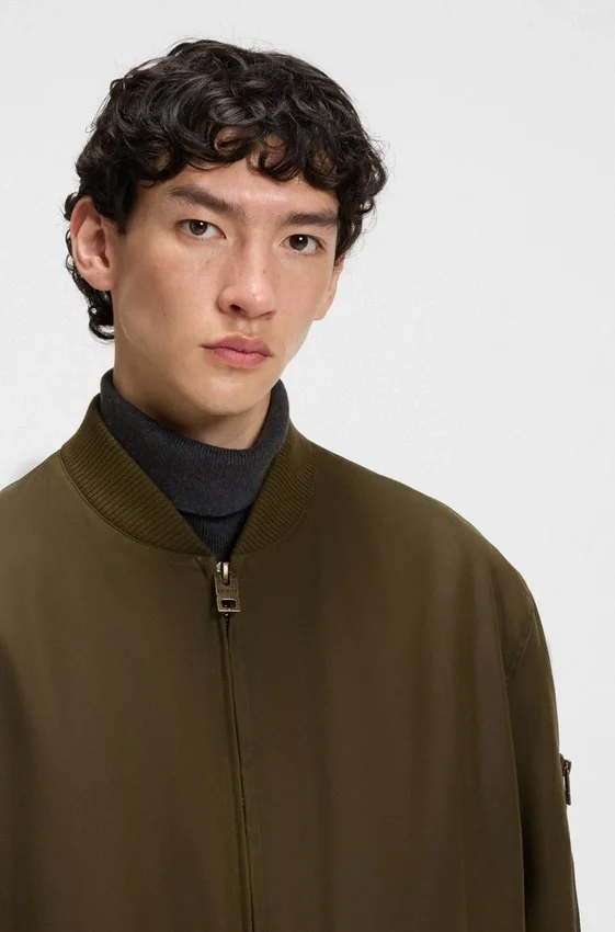Adjustable-hem bomber jacket in waxed cotton Adjustable-hem bomber jacket in waxed cotton