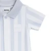 Baby romper in striped cotton with polo collar Baby romper in striped cotton with polo collar