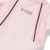 Baby sleepsuit in velvet with logo print
