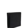 Billfold wallet with perforated monogram motif