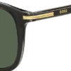 Black acetate sunglasses with gold-tone trims Black acetate sunglasses with gold-tone trims