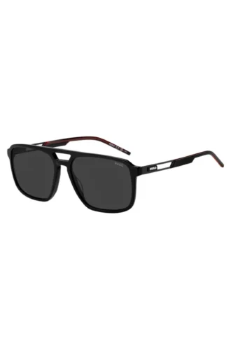 Black acetate sunglasses with rubber logo
