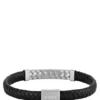 Black braided leather cuff with herringbone hardware Black braided leather cuff with herringbone hardware