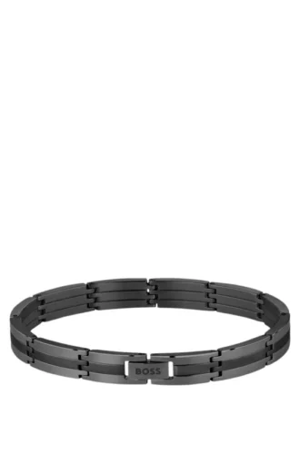 Black stainless-steel striped cuff with logo clasp