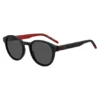 Black sunglasses with round frames and patterned temples