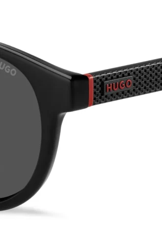 Black sunglasses with round frames and patterned temples