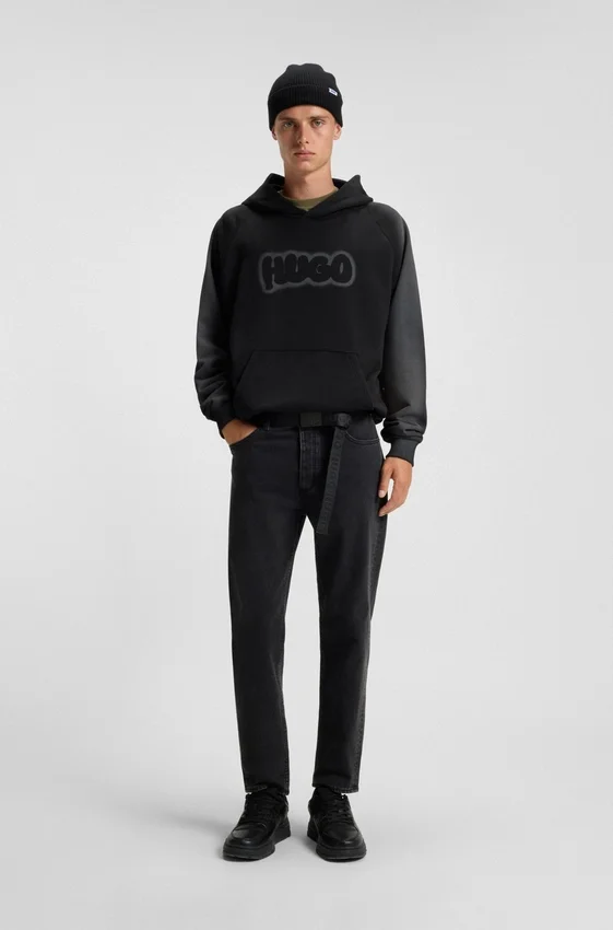 Black tapered-fit jeans in grain-effect denim Black tapered-fit jeans in grain-effect denim