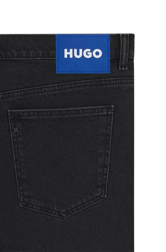Black tapered-fit jeans in grain-effect denim Black tapered-fit jeans in grain-effect denim