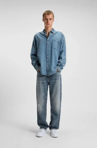 Blue baggy-fit jeans in distressed denim