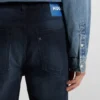 Blue-black tapered-fit jeans in stretch denim