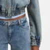 Blue bomber jacket in stretch denim