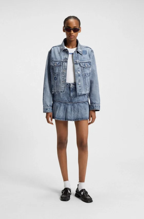 Blue rigid-denim mini skirt with half pleating Blue rigid-denim mini skirt with half pleating