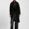 Bouclé coat with stand collar and belt