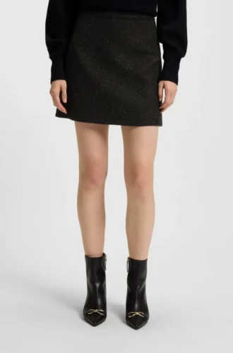 Bouclé mini skirt with chain tape