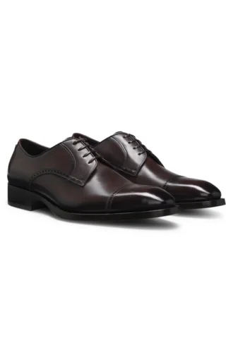 Brogue-detail Derby shoes in leather