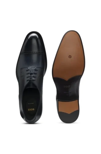 Brogue-detail Derby shoes in leather