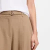 Buckled-belt trousers with pleat front