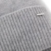 Cashmere beanie with metallic logo trim