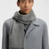 Cashmere scarf with twisted fringes Cashmere scarf with twisted fringes
