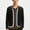 Contrast-stripe sweater with button front