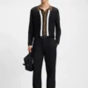 Contrast-stripe sweater with button front
