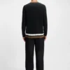 Contrast-stripe sweater with button front
