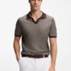 Cotton-blend knit polo with horizontal stripe.