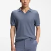 Cotton-blend knit polo with horizontal stripe.