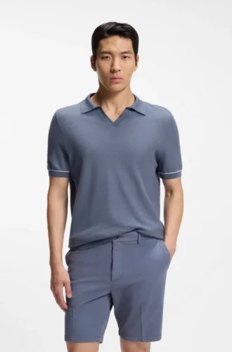 Cotton-blend knit polo with horizontal stripe.