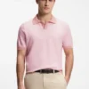 Cotton-blend knit polo with horizontal stripe.