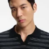 Cotton-blend knit polo with horizontal stripe.
