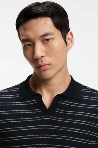 Cotton-blend knit polo with horizontal stripe.