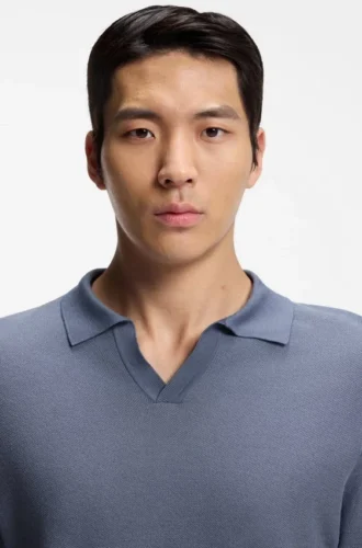 Cotton-blend knit polo with horizontal stripe.