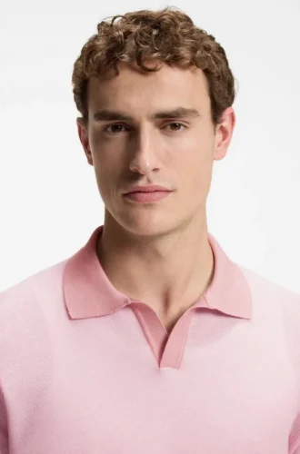 Cotton-blend knit polo with horizontal stripe.