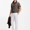 Cotton-blend knit polo with horizontal stripe.