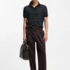 Cotton-blend knit polo with horizontal stripe.