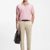 Cotton-blend knit polo with horizontal stripe.