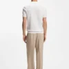 Cotton-blend knit polo with horizontal stripe. Cotton-blend knit polo with horizontal stripe.
