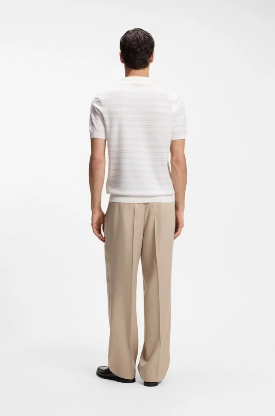 Cotton-blend knit polo with horizontal stripe. Cotton-blend knit polo with horizontal stripe.
