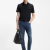 Cotton-blend polo shirt with bubble-structured jacquard