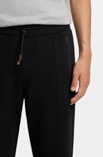 Cotton-blend tracksuit bottoms in a regular fit
