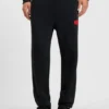 Cotton-blend tracksuit bottoms with waxed-stamp logo