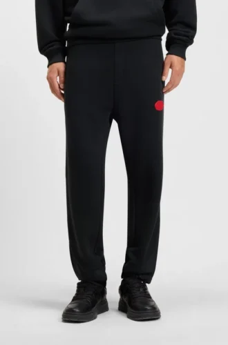 Cotton-blend tracksuit bottoms with waxed-stamp logo Cotton-blend tracksuit bottoms with waxed-stamp logo