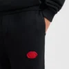 Cotton-blend tracksuit bottoms with waxed-stamp logo